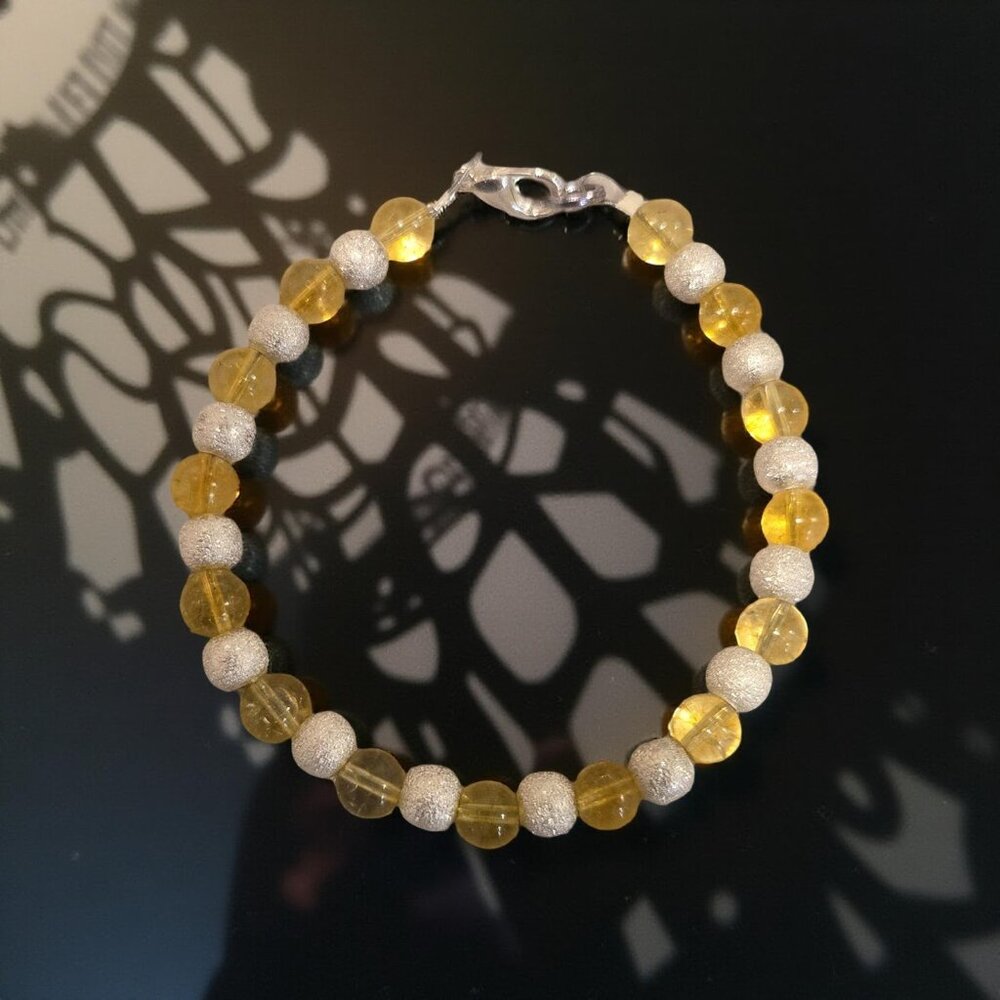Citrine and Silver stardust beads  7 in. Bracelet